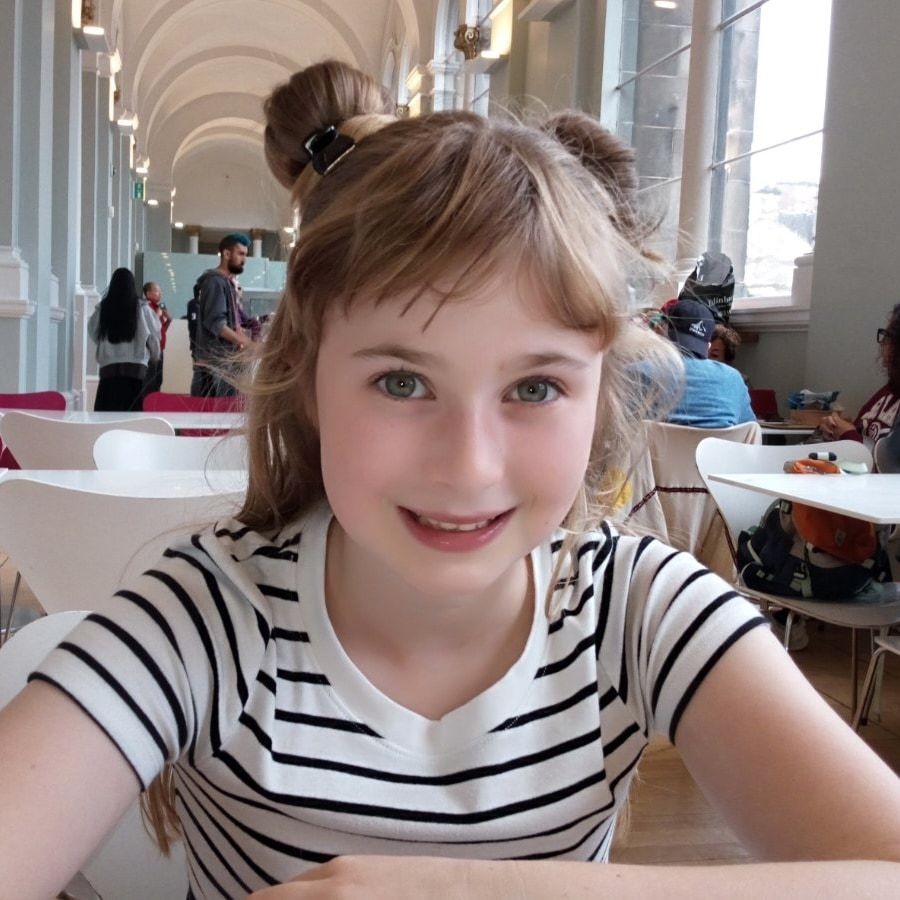 Angelina smiles at the camera